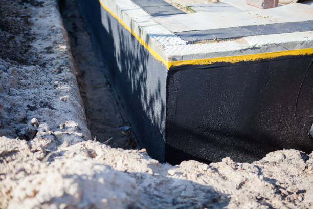 Professional Waterproofing technician working in Foster, KY